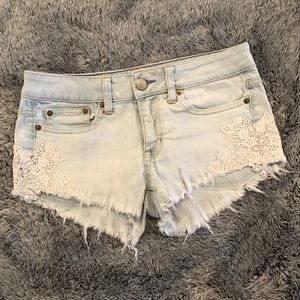 AE jean shorts, size 2. Lace and fray detailing!